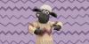 Shaun the sheep wearing a knitted jumper