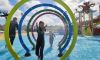 Girl in spray tunnel waterpark, Shipwreck Island, Paignton