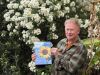 Toby Buckland holding an eco magazine