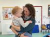 Westbank's Kidzone Manager Lucy Elliott with one of the toddlers in her care 