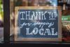 Shallow focus photo of 'thank you' for shopping signage - By Tim Mossholder