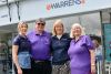 Warrens and dementia awareness people stood outside of warrens